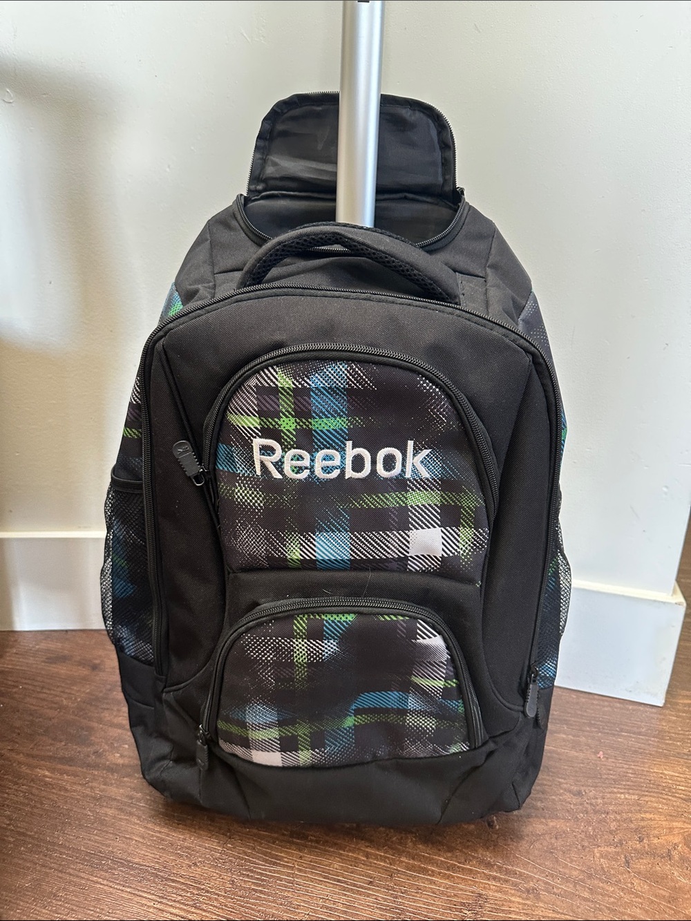 Reebok backpack on wheels.